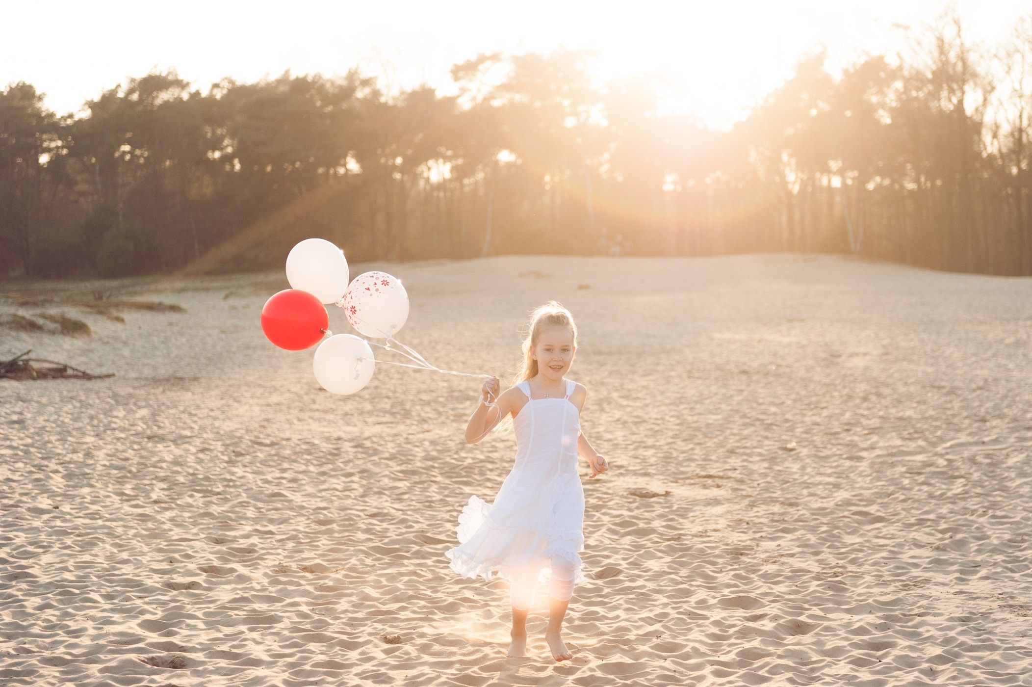 Ballonen zijn favoriete accessoires bij communie foto's
