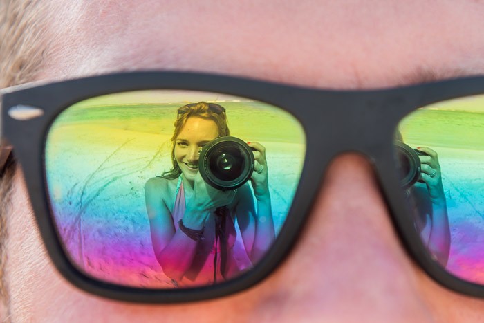 Cliche vakantiefoto's: reflectie in zonnebril