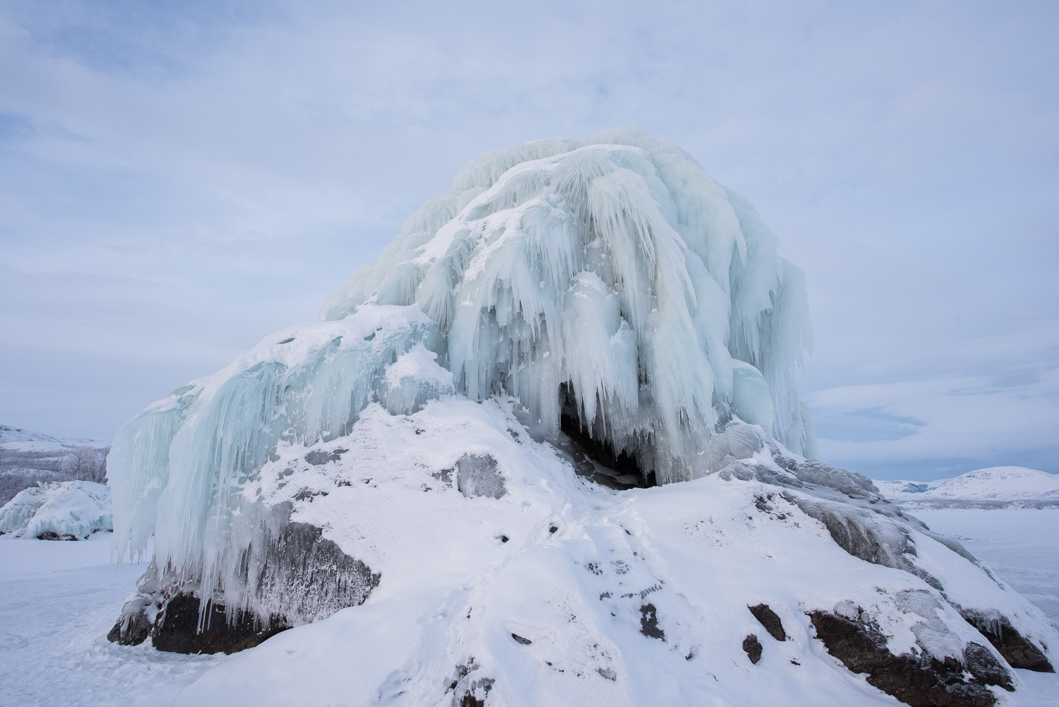 IJs fotograferen: ijspegels op een rots