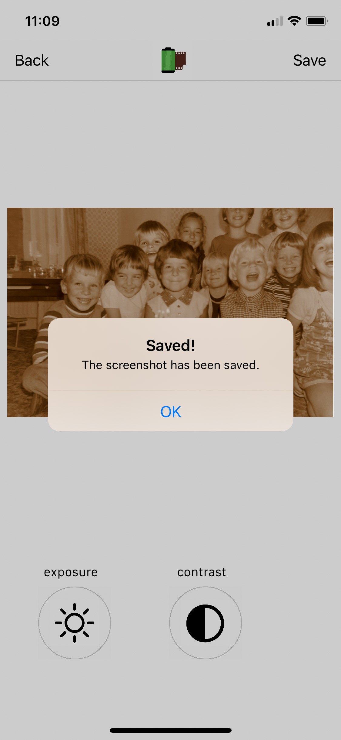 De foto wordt opgeslagen in je filmrol.