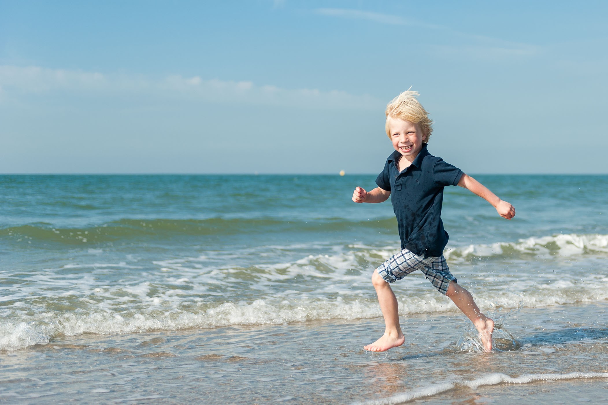 Horizonplaatsing bij kinder- en portretfotografie op het strand