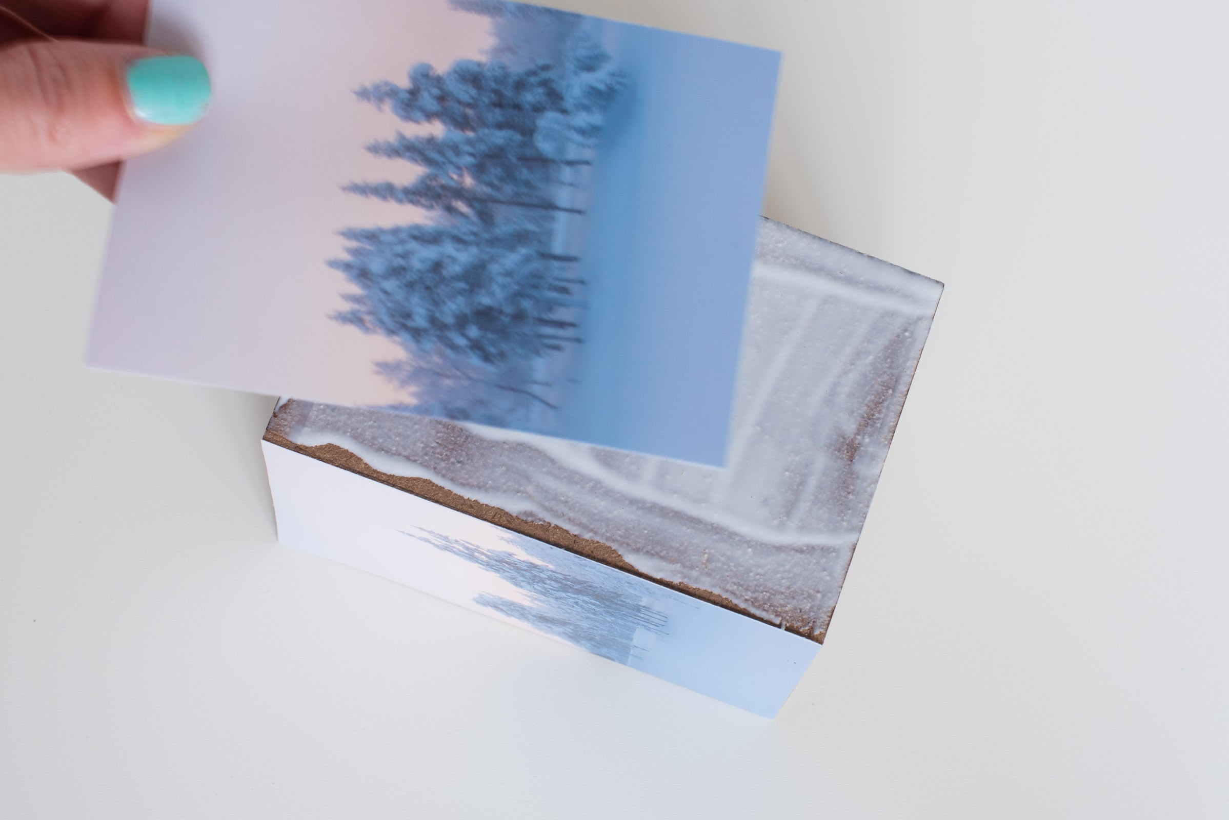 Plak de foto op de zijkant