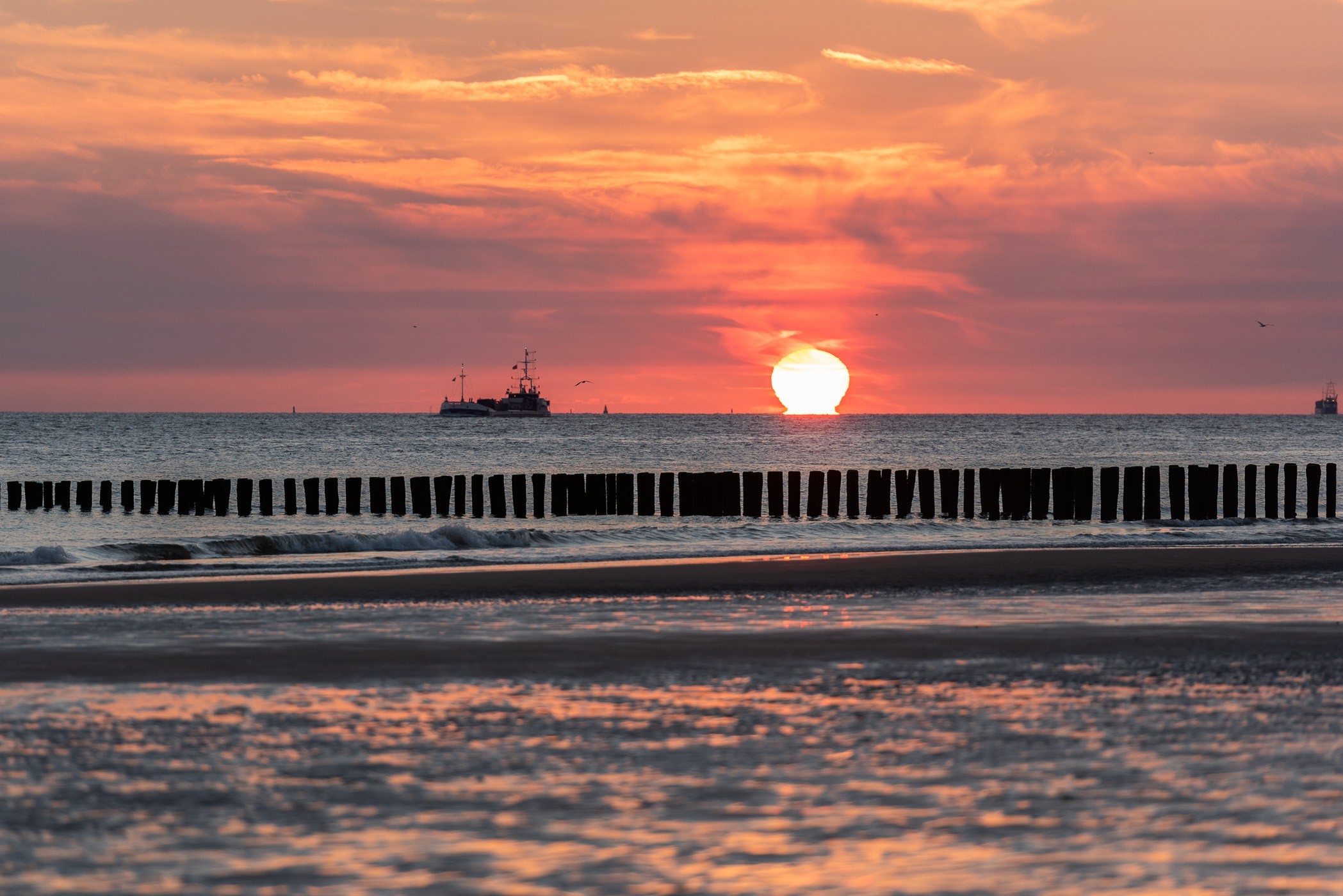 We zagen de zon mooi in de zee zakken!